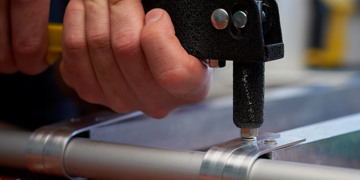 Installing Rivets to an Aluminum Base with a Riveter