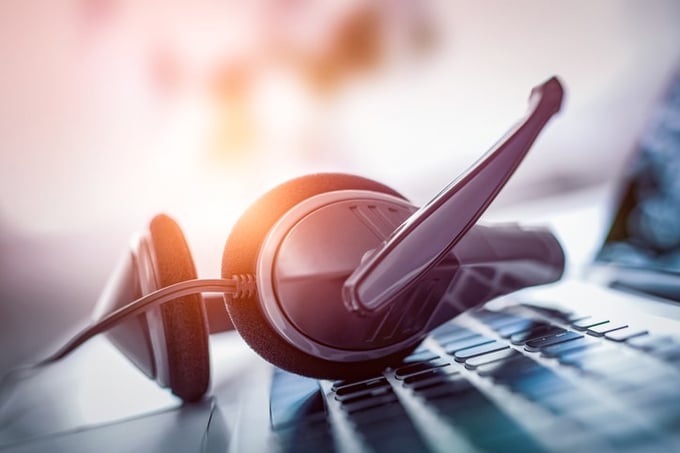 Headset sitting on a laptop keyboard