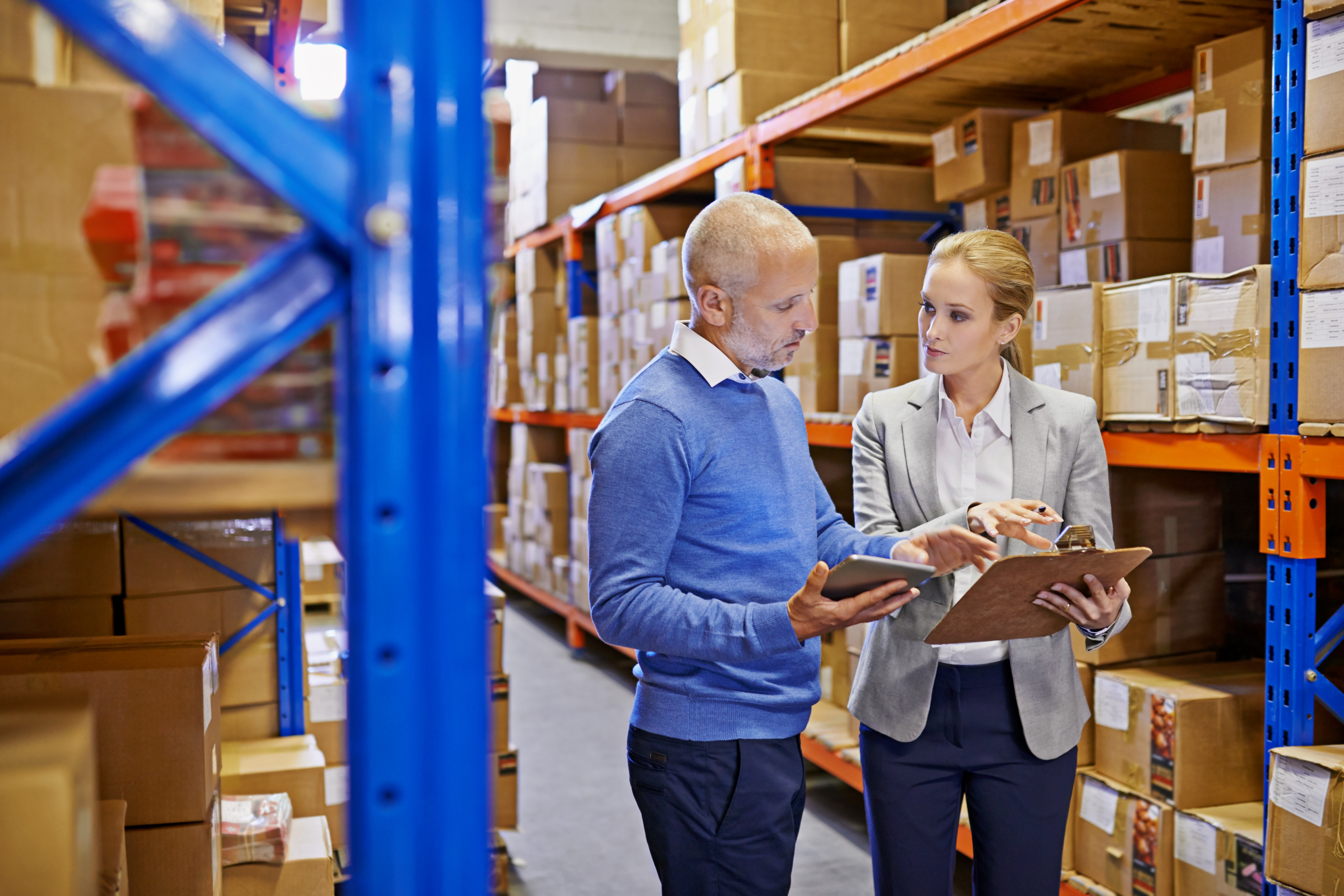 Factory manager having a discussion with a potential fastener supplier